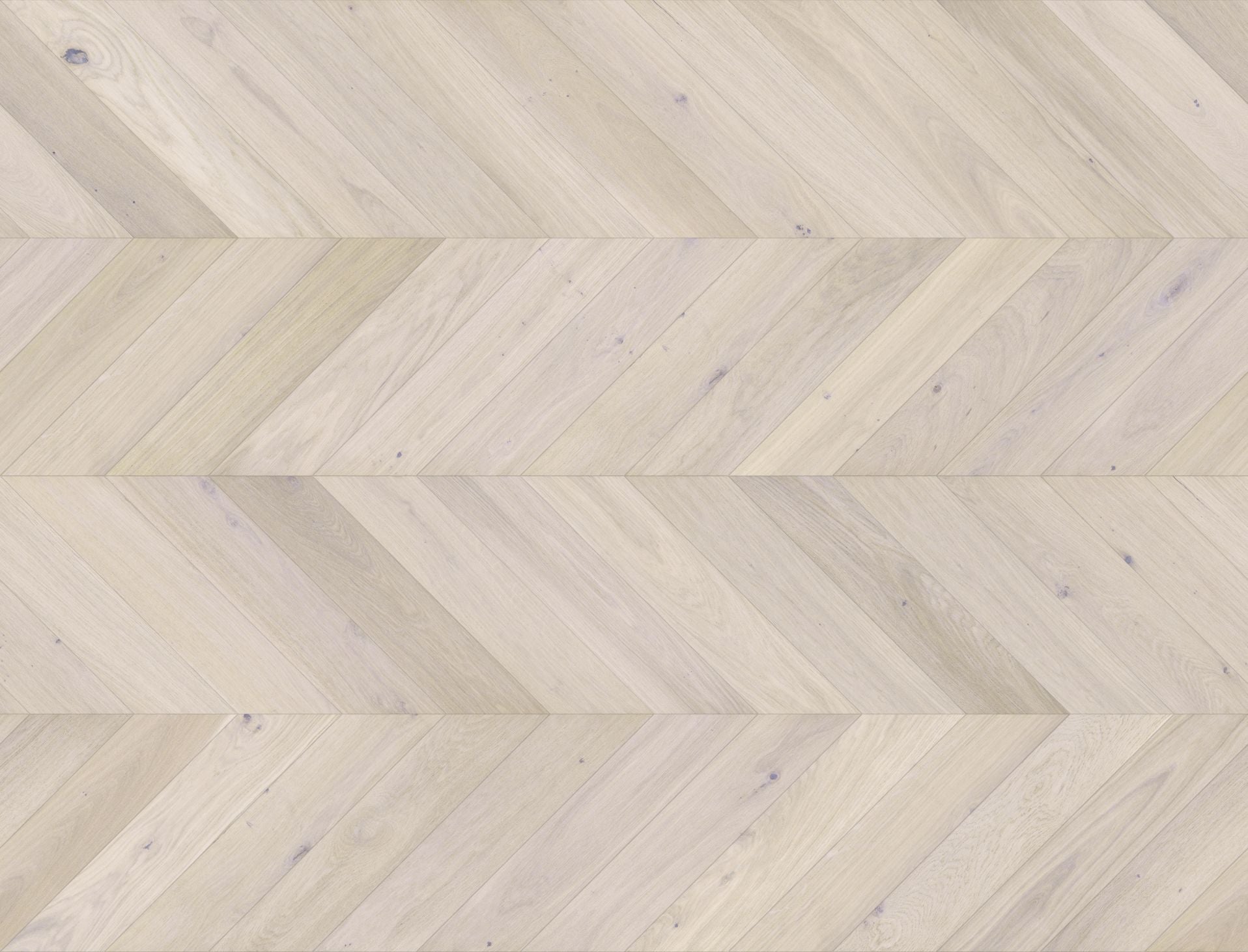Luxury light wood flooring laid in chevron pattern