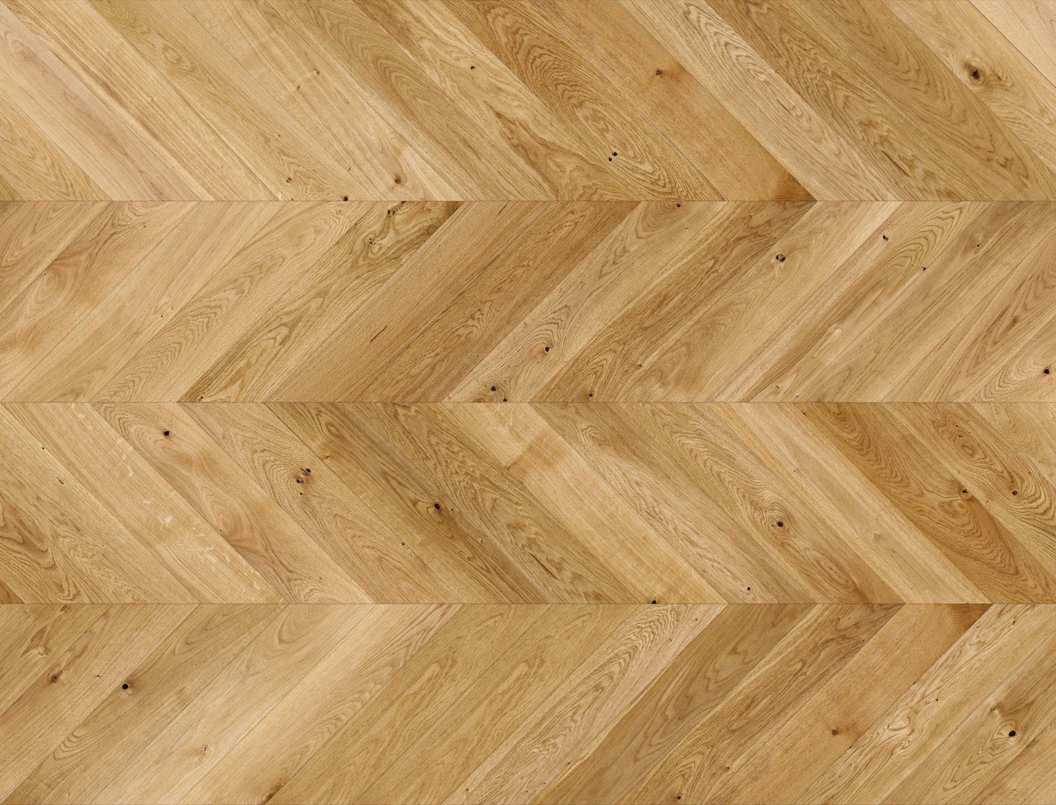 Natural wood flooring laid in chevron pattern