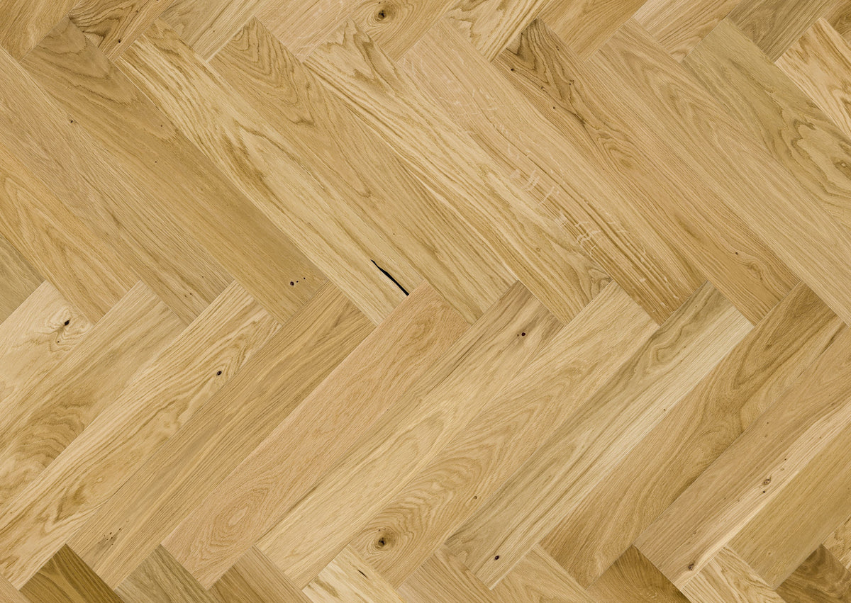 quality natural wood flooring laid in herringbone pattern